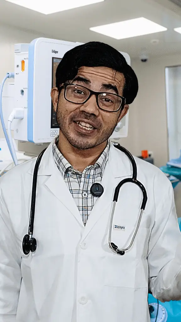 Doctor Saheb, the family doctor character in Pandey Ke Bandey, wearing a white coat and stethoscope with a professional demeanor.