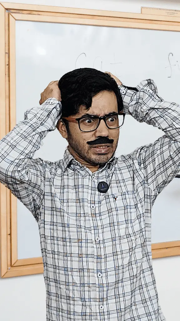 Master Ji, the strict but comical school teacher character in Pandey Ke Bandey, pulling his hair in frustration.