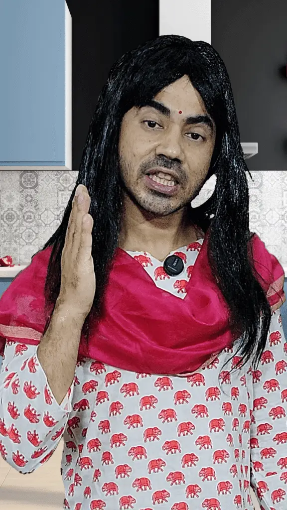 Mrs. Pandey, Pandey Ji's wife and Ivaan's mother, holding a belan with a playful but firm expression.